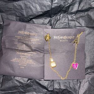 YSL Beauty phone charm